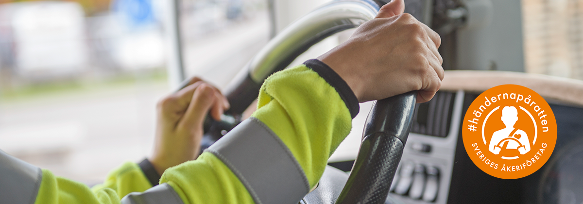 Händerna på ratten_header.png.